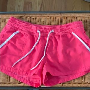 Neon pink swim trunks